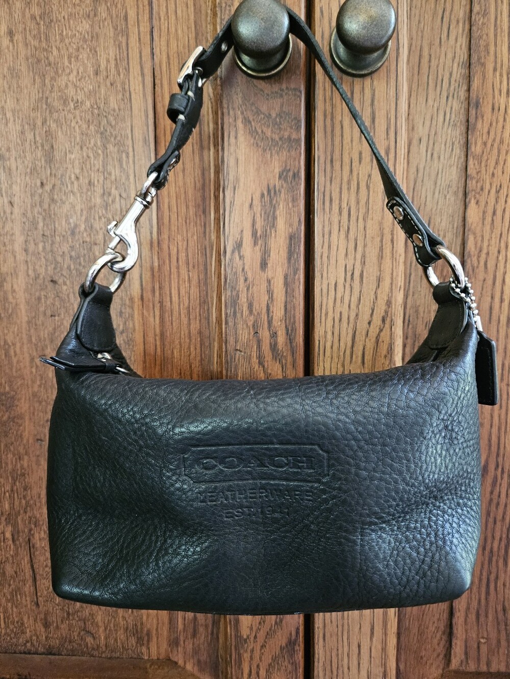 Coach black pebbled leather baguette mini bag